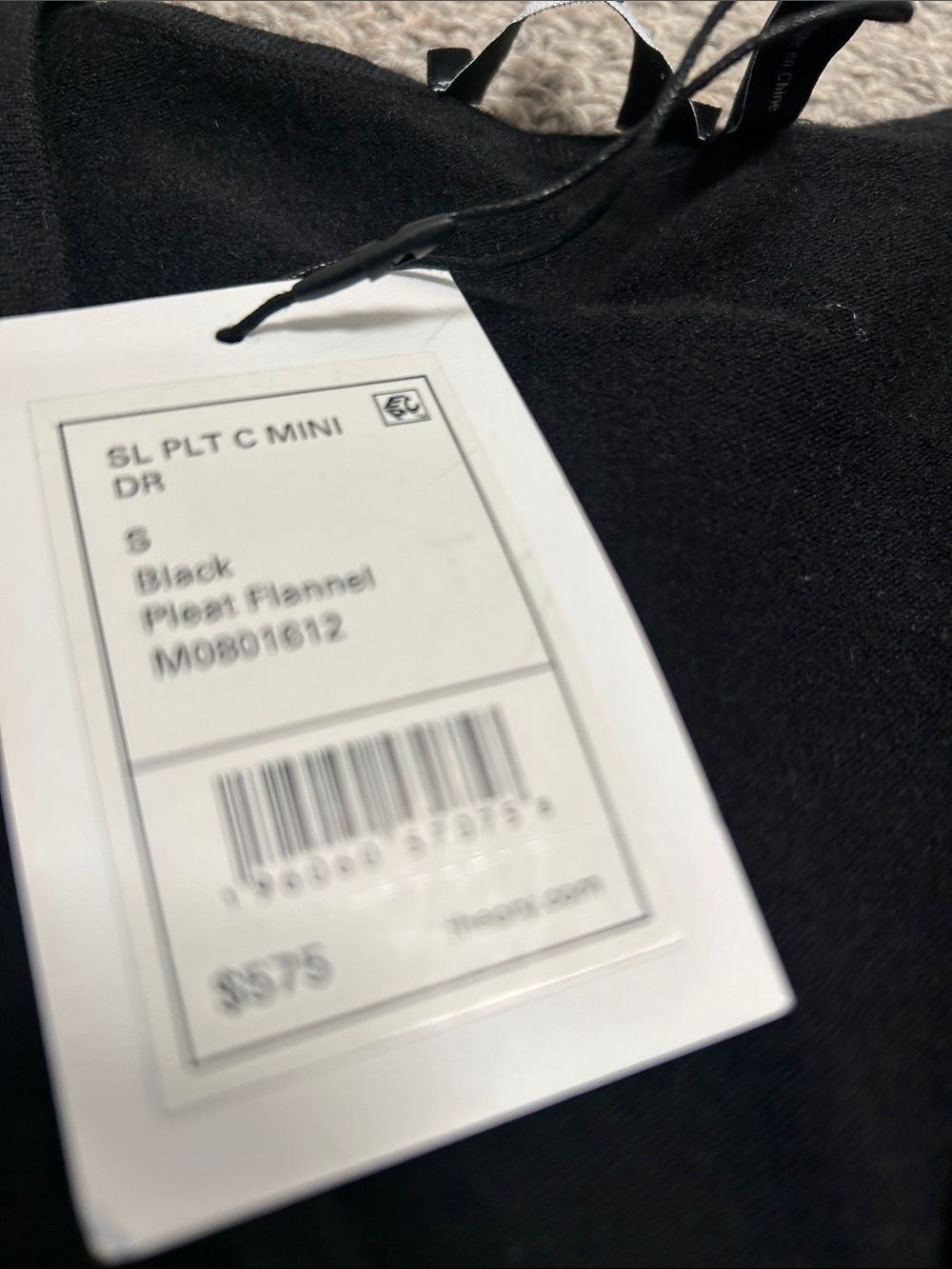 Product Tag on Black Garment